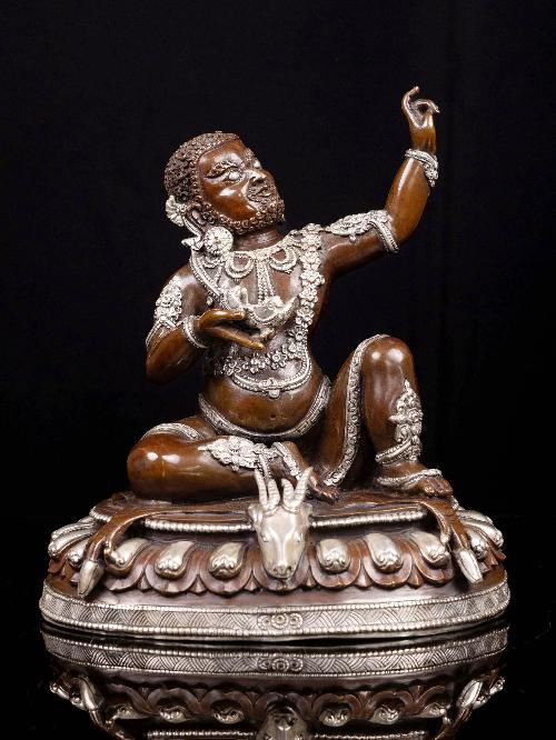 This 22cm tall Milarepa, Buddhist Handmade Statue, Silver And Chocolate Oxidized (Product Code: HMS35716) weighs 2.4kg and is available at an offer price of US$120.