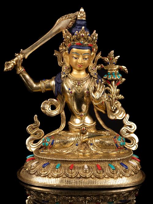 This 23cm tall Manjushri Buddhist Handmade Statue, Full Gold Plated,stone Setting, Face Painted (Product Code: HMS36091) weighs 2.11kg and is available at an offer price of US$216.