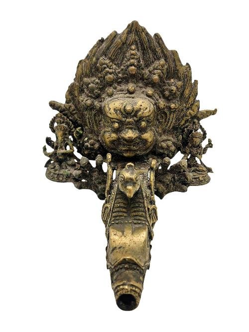 This 17cm tall Unique, Traditional Dhunge Dhara Stone Water Tap With Mahakala Bhairava, Lakshmi And Ganesh, Antique Finishing (Product Code: HMS37029) weighs 1.64kg and is available at an offer price of US$396.