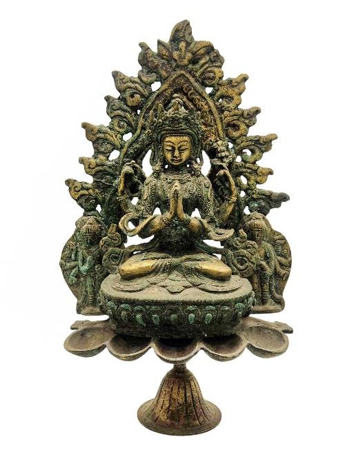 This 28cm tall Chenrezig, Buddhist Handmade Statue With Oil Lamp, Antique Finishing (Product Code: HMS37033) weighs 1.55kg and is available at an offer price of US$330.