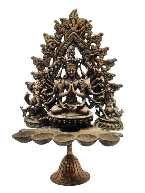 This 26cm tall Cundi With Ganesh And Yellow Jambhala, Buddhist Handmade Statue With Oil Lamp, Antique Finishing (Product Code: HMS37034) weighs 1.45kg and is available at an offer price of US$330.